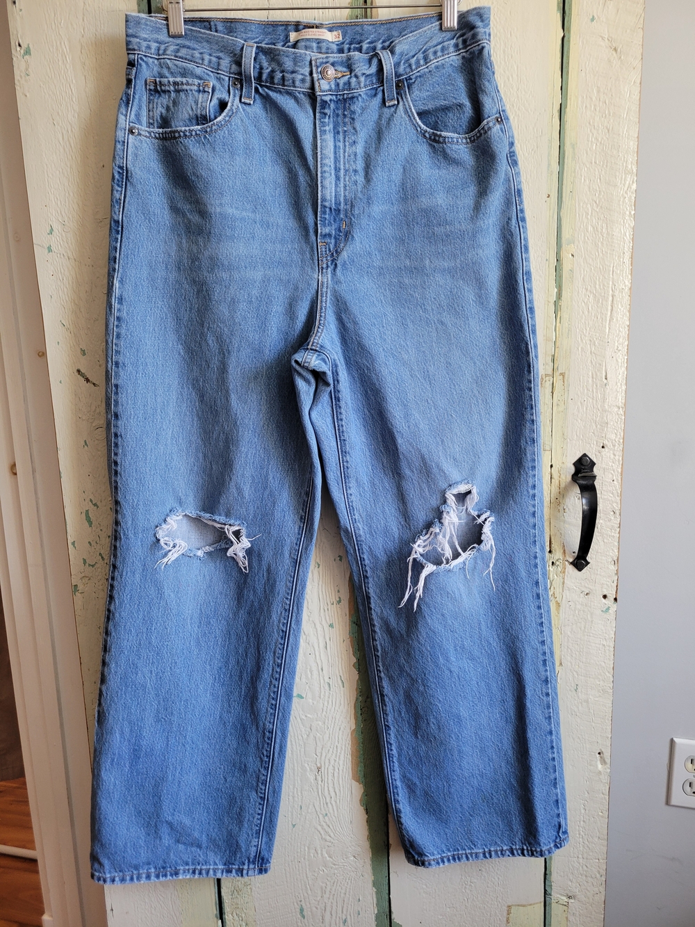 Levi's Light Blue Straight Leg Jeans with Distressed Knees